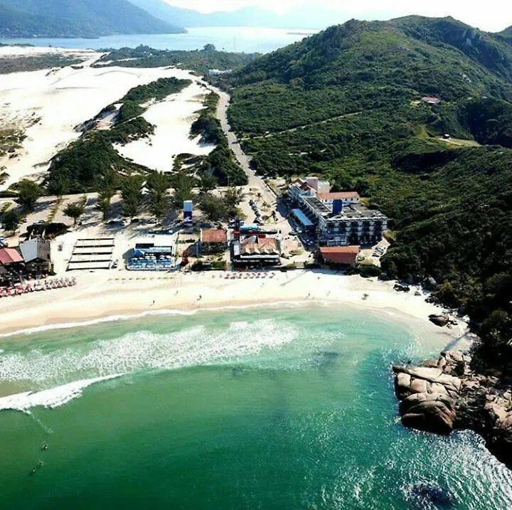 Pousada Dunas Da Joaquina Suites フロリアノポリス アパート